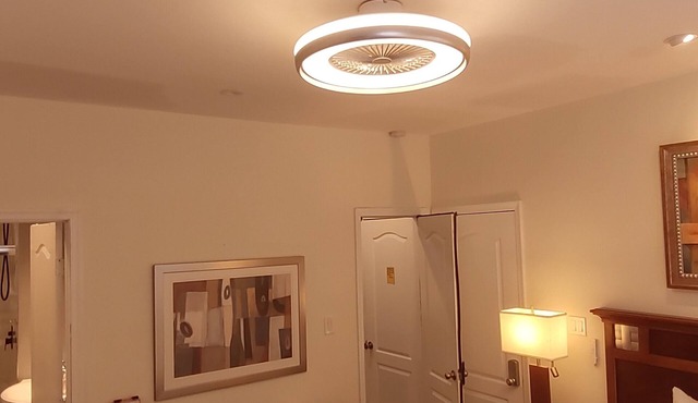 Guest Suite by Ameridency: 1 King Bed, 1 Bath with Rain Shower, Full Kitchen