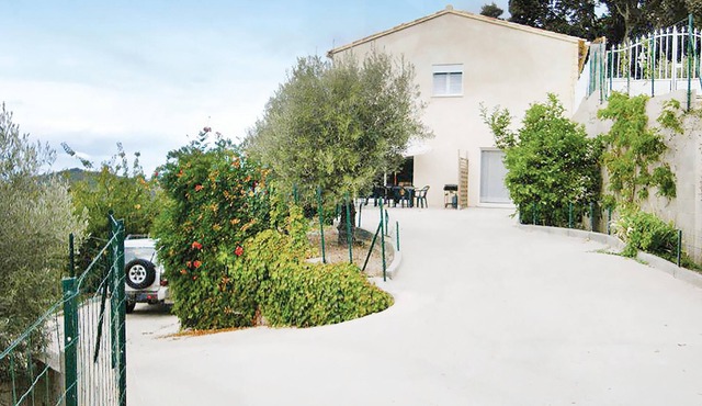 Guests of this apartment on the ground floor of a villa have next to two terraces.