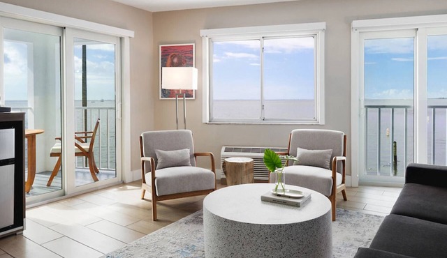 Gulf Coast Retreat | Lounge by Two Pools | Private Beach & Marina Access