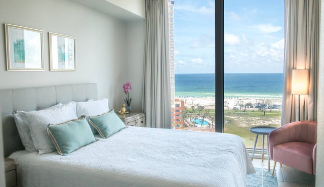 Gulf facing, modern 2 bedroom condo! Pools, hot tubs, restaurants & many extras!