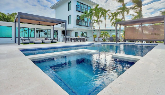 Gulfside Waterfront Luxe Estate w/private beach, pool, spa, boat dockage