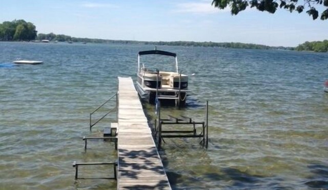 Gun Lake 5-STAR PROPERTY sandy front with full dock and mooring bouy