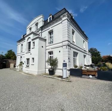 Hôtel Échappée en Baie - Parking privé gratuit dont forfaits bornes électriques réservable