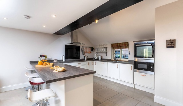 H C Property 'The Byre'