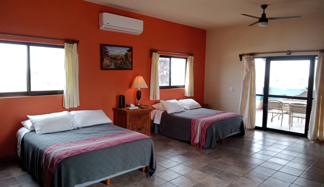 Hacienda de Palmas: Room #1 Grande with two queen size beds and sofa bed