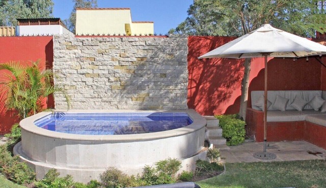 Hacienda-style colonial house near vineyards