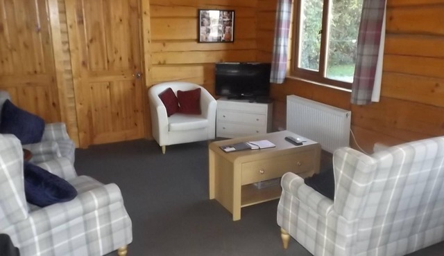 Hand built log cabin at Avonvale Holiday Lodges