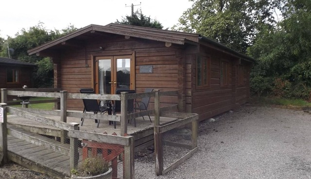 Hand built log cabin at Avonvale Holiday Lodges