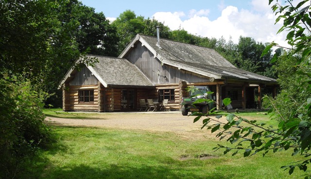 Hand Crafted large Log Cabin . Rural Location , lovely views and walks , quiet .