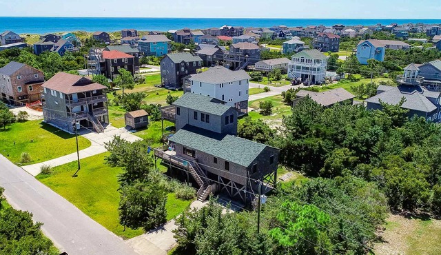 Handsome raised home with private hot tub, & central AC