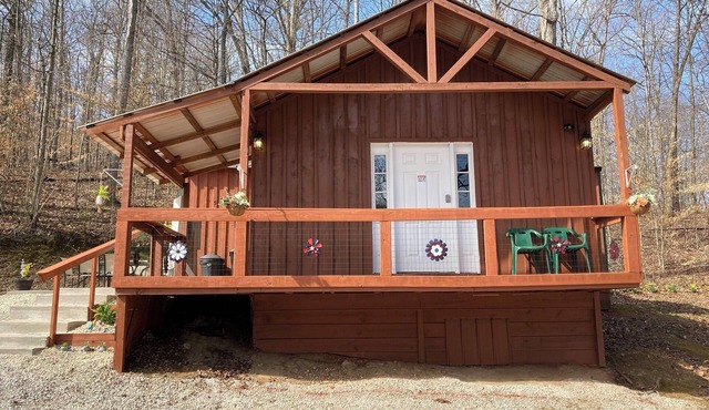Happy Hills 🙂It’s a three bedroom one bath cabin with a side patio and garage