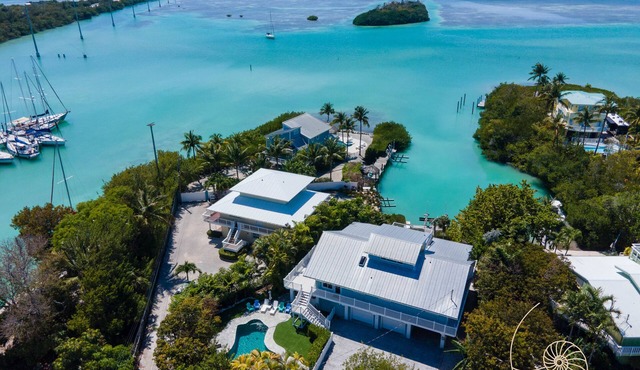 Harbor Hideaway ~ Island style beach house with pool, dockage & bay views!