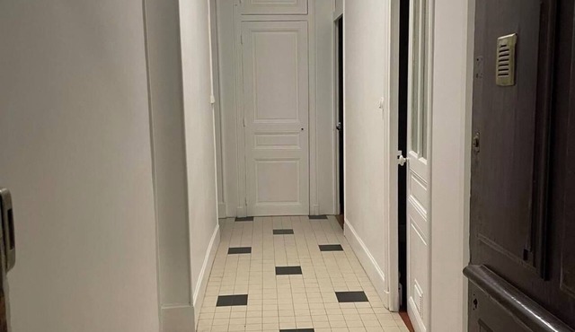 HAUSSMANIAN CITY APARTMENT WITH GARDEN