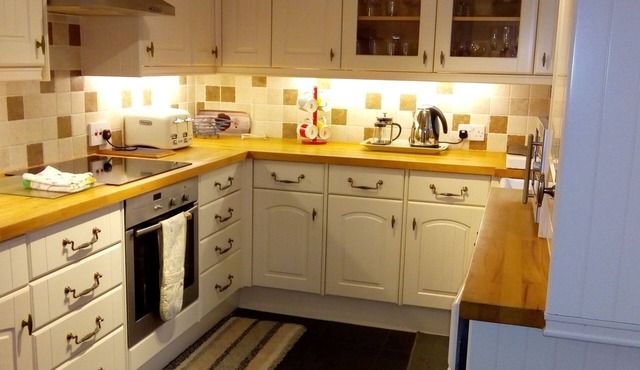 Heart of beautiful Betws-y-Coed - well-equipped Victorian stone railway cottage