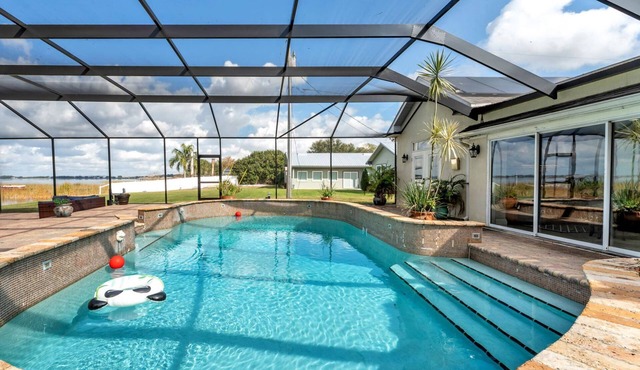 Heated Pool Backyard Fun | Kayaks | Boat Dock | Lake Access | Theater Room | EV Charger Theme Parks