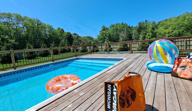 Heated pool hot tub play set screened porch sauna putting green