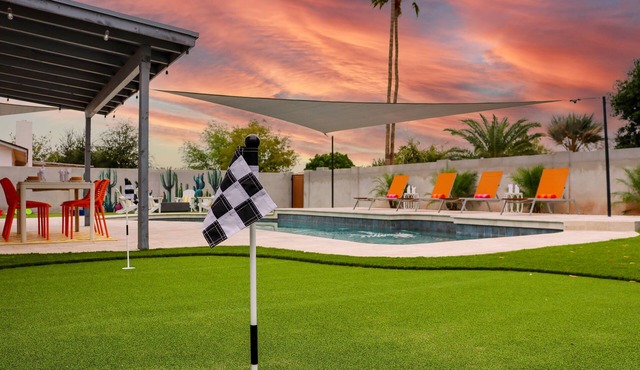 Heated Pool + Putting Green + 2 Car Garage