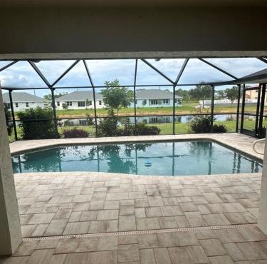 Heated pool with canal views