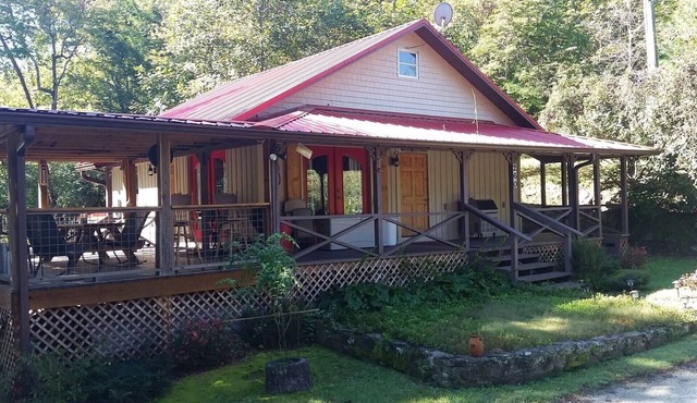 HENRY’S red roof cabin on the Chauga River