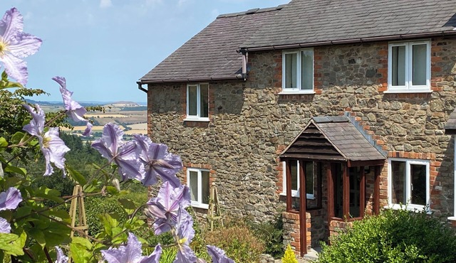 HERON COTTAGE, pet friendly, with open fire in Hope, Shropshire