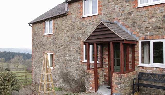 HERON COTTAGE, pet friendly, with open fire in Hope, Shropshire