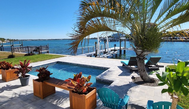 Hidden Gem! Treasure Island Waterfront 2/2 with a pool and dock!