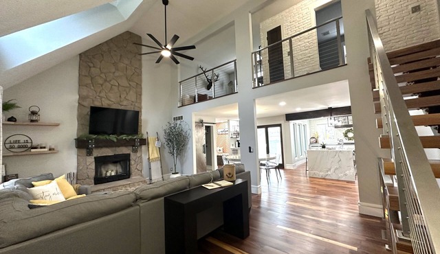 High-end home w/fireplace, gourmet kitchen, sauna, game rm/large yard/fire pit