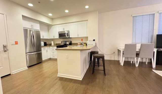 high end studio apartment with pool, fitness room. 1.5 miles to UCI and Airport.