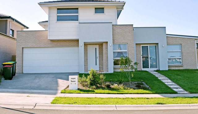 High-Ranking Two-Level House with 4 Br Gables