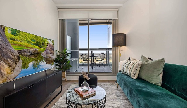 High-Rise Balcony Unit with City Views, Gym, Pool