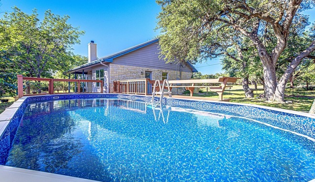 Hill country compound! Two 4 BDRM Homes with Pools On 8 Acres Riverfront
