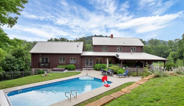 Hillside haven on expansive grounds, heated pool, firepit, bocce court and more!