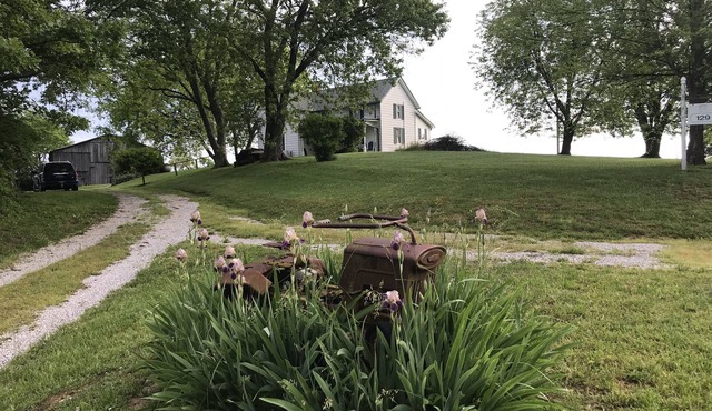 Hilltop Farmhouse with sunrise sunset porch overlooking hills and holler