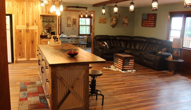 Hilltop Getaway on 140+ private wooded acres with trails, pond, beautiful view!