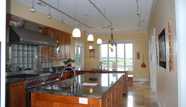 Hilltop home. Unparalleled views and serenity while still in the City.