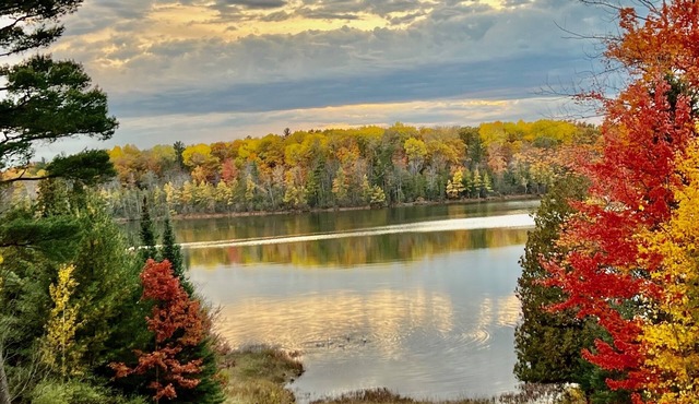 Hilltop House with awesome views on East Stylus Lake set on many acres.