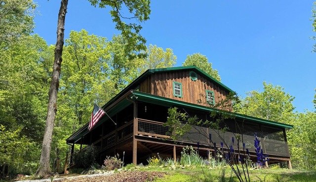 Hilltop Retreat- quiet and private, hot tub and 20 acres of wilderness.