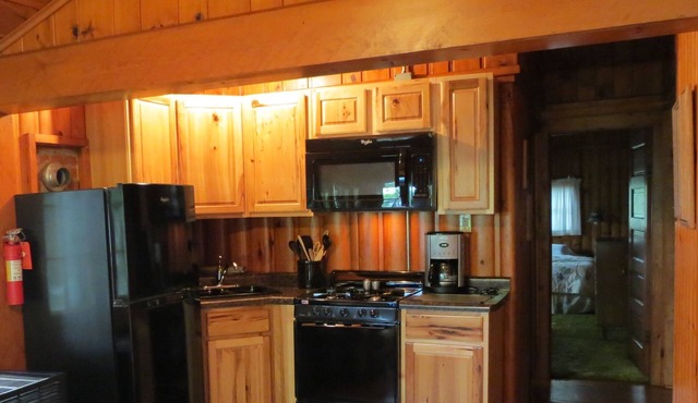 Historic 3 bedroom, 2 bath, directly on a 3 lake chain! Rental Boats available!