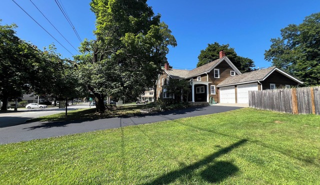 Historic 5-bedroom house with beautiful back yard suitable for private events.