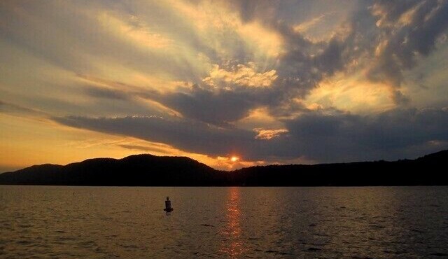 HISTORIC ADIRONDACK CAMP WITH 100 FT OF LAKE FRONTAGE & ALL MODERN AMENITIES