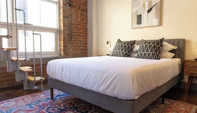 Historic brick charm 1BR downtown