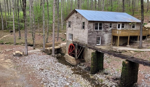 Historic Cabin in a natural setting with waterfalls and covered bridge