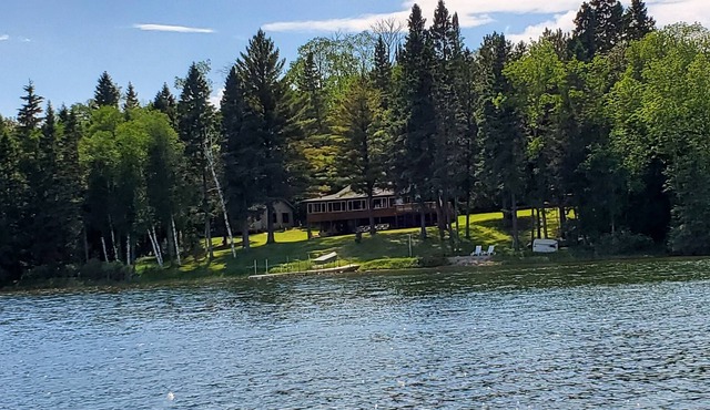 Historic Cabin on Big Elbow Lake. MIDWEEK SPECIALS -June and August