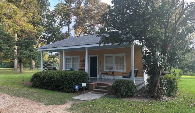 Historic cottage privately situated on the grounds of the Foster Mounds.
