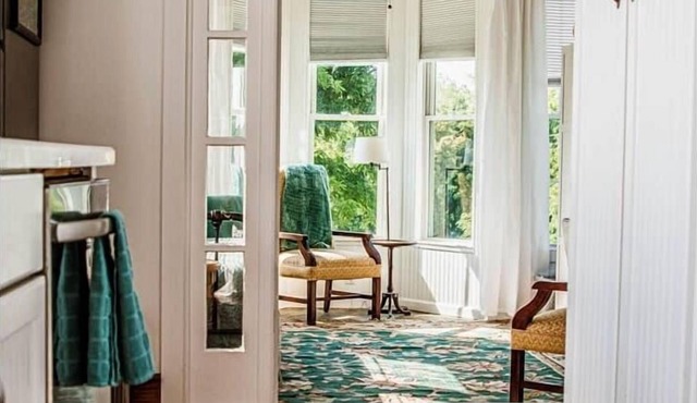 Historic cottage with a bright, sun-drenched interior, offering the ultimate peaceful getaway.