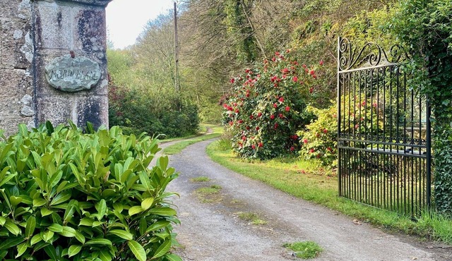 Historic country house on the river. Pink granite coast excursion destination