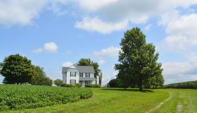 Historic farmhouse near Marshall with epic sunsets
