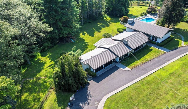 Historic hilltop estate with hot tub, fireplace, theater, and mountain views