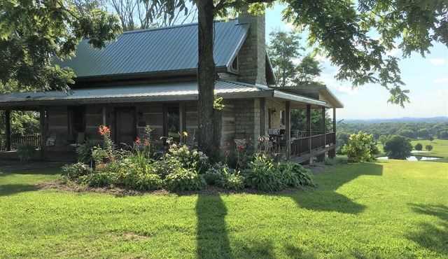 Historic Log Cabin on 200 acre farm, pasture and forest with panoramic views!