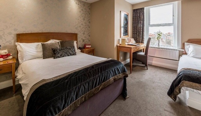 Historic Seaside Room with Breathtaking Views & Central Location